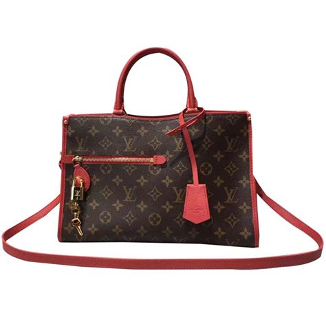 louis vuitton black bag with red interior